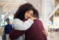 Couple, hug and smile in goodbye at airport for travel, trip or flight in farewell for long distance relationship. Man