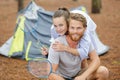 couple hugging with badminton rackets Royalty Free Stock Photo