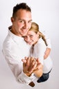 Couple hugging and displaying engagement ring Royalty Free Stock Photo