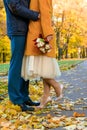 Couple is hugging, the girl is holding a wedding bouquet of whit Royalty Free Stock Photo