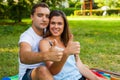 Couple hugging and having picnic in park Royalty Free Stock Photo