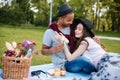 Couple hugging and having picnic in park Royalty Free Stock Photo