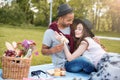 Couple hugging and having picnic in park Royalty Free Stock Photo