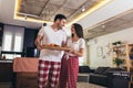 Couple hugging in the kitchen at home in the morning Royalty Free Stock Photo