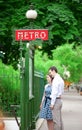 Couple is hugging near the metro station in Paris Royalty Free Stock Photo