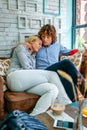 Couple hugging on a sofa Royalty Free Stock Photo
