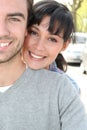 Couple hugging in the street