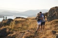 Couple Hugging On Top Of Hill On Hike Through Countryside In Lake District UK Royalty Free Stock Photo