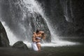 Couple Hugging Under Waterfalls Royalty Free Stock Photo