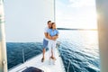 Couple Hugging On Yacht Spending Honeymoon Sailing Across The Sea Royalty Free Stock Photo