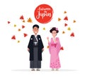 Couple Japanese people with traditional costume in autumn. Maple leaves flow in Background.