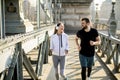 Couple jogging on Chain Bridge in Budapest Royalty Free Stock Photo