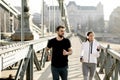 Couple jogging on Chain Bridge in Budapest Royalty Free Stock Photo