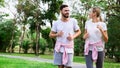 Couple jogging, running in the garden