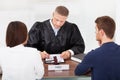 Couple with judge in court Royalty Free Stock Photo