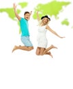 Couple jumping against world map