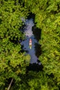 couple kayak in jungle of Krabi Thailand, men and woman kayak in tropical jungle mangrove forest.