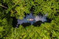couple kayak in jungle of Krabi Thailand, men and woman kayak in tropical jungle mangrove forest. Royalty Free Stock Photo
