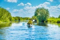 Couple at kayak trip on blue river