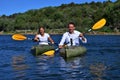 Couple Kayaking on lake