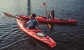 Couple kayaking on sunset Royalty Free Stock Photo