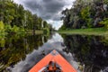 Couple kayaking together in mangrove river. Royalty Free Stock Photo