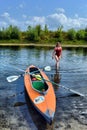 Couple kayaking together in river. Tourists kayakers touring the river Royalty Free Stock Photo