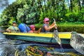 Couple kayaking together in river. Tourists kayakers touring the river Royalty Free Stock Photo