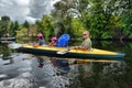 Couple kayaking together in river. Tourists kayakers touring the river Royalty Free Stock Photo