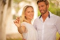 Couple With Keys Standing Outside. Royalty Free Stock Photo