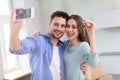 Couple with keys to new home Royalty Free Stock Photo