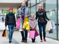 Couple with kids on city street Royalty Free Stock Photo