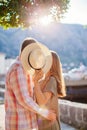 Couple Kissing Behind Hat Royalty Free Stock Photo