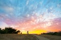 Couple kissing during a colorful sunset Royalty Free Stock Photo