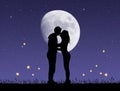 Couple kissing with fireflies