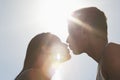 Couple Kissing In Sunlight