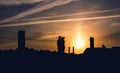 Couple kissing in a sunrise