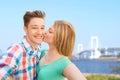 Couple kissing and taking selfie over bridge Royalty Free Stock Photo