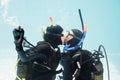 Couple kissing underwater while scuba diving Royalty Free Stock Photo