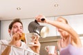 Couple in kitchen having breakfast