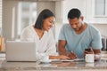 Couple, kitchen and paperwork for budget, finance or smile with laptop, phone and writing notes in home. Man, woman and Royalty Free Stock Photo