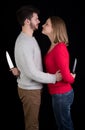 Couple with knives Royalty Free Stock Photo