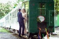 Couple on a ladder of wagon Royalty Free Stock Photo