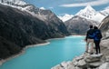 Couple in Laguna Paron lookout. Huascaran National Park, Peru Royalty Free Stock Photo