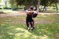 Couple of latin and bachata dancers dancing in a square. They are a young and handsome man and a beautiful woman. Dance concept Royalty Free Stock Photo