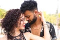 Couple of latin and bachata dancers dancing in a square. They are a young and handsome man and a beautiful woman. Dance concept Royalty Free Stock Photo