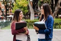 Couple of latin female student or international students in internship in Mexico City Royalty Free Stock Photo