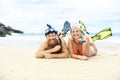 Couple lay on the beach is going to swim and snorkle on hawaii beach Royalty Free Stock Photo