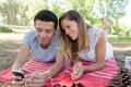 Couple laying on grass Royalty Free Stock Photo