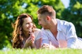 Couple laying on park Royalty Free Stock Photo